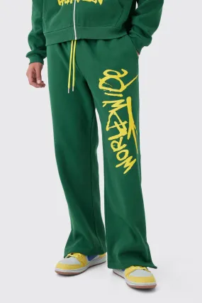 Lockere Jogginghose mit Graffiti-Print und geteiltem Saum